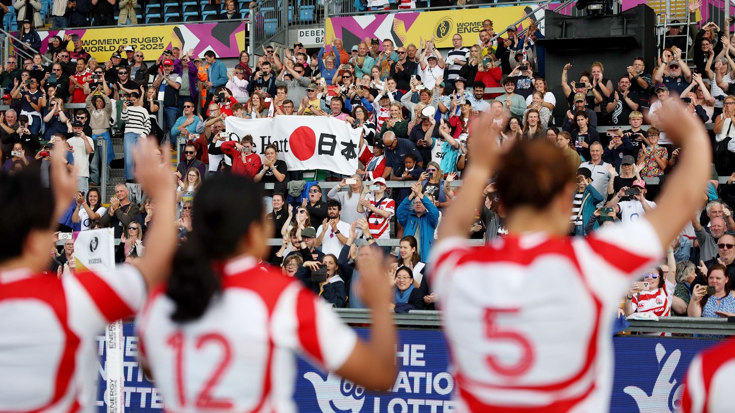 Japan players wave to the crowd